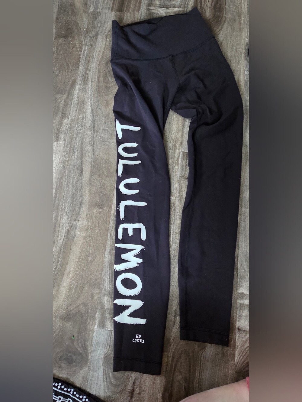 lululemon athletica Black Leggings with White 'LULULEMON' Side Script